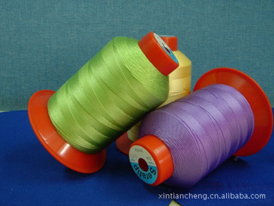 青島新天成紡織 廠家直銷優質短纖縫紉線與滌綸阻燃紗